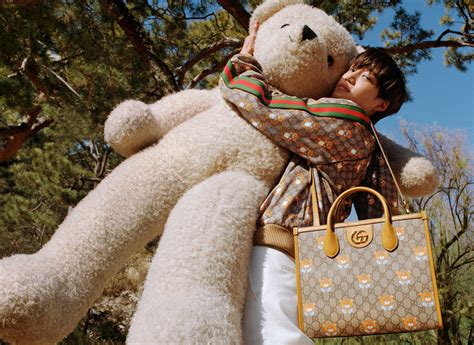 gucci boy kai|Gucci teddy bear bag.